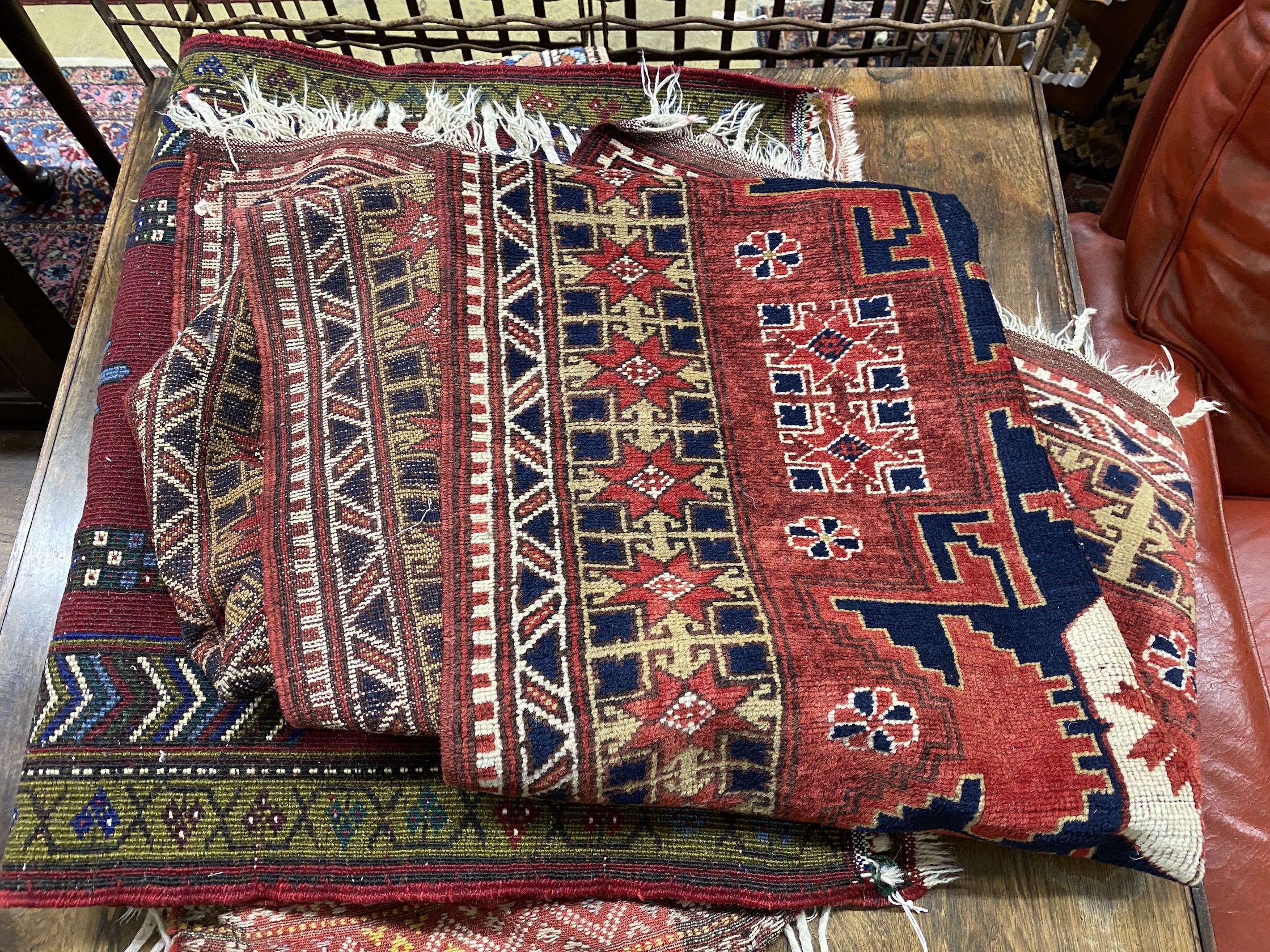 Six assorted Caucasian, Turkish and Persian style rugs